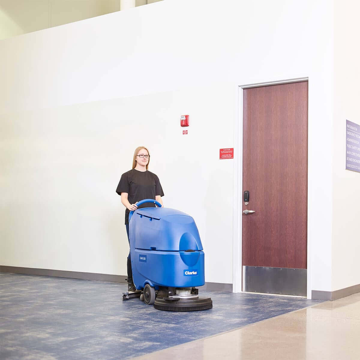 Clarke Cordless Walk Behind Orbital Floor Scrubber - Advanced cleaning solution with a 24-inch AGM orbital brush and chemical-free surface prep, designed for efficient commercial floor maintenance.