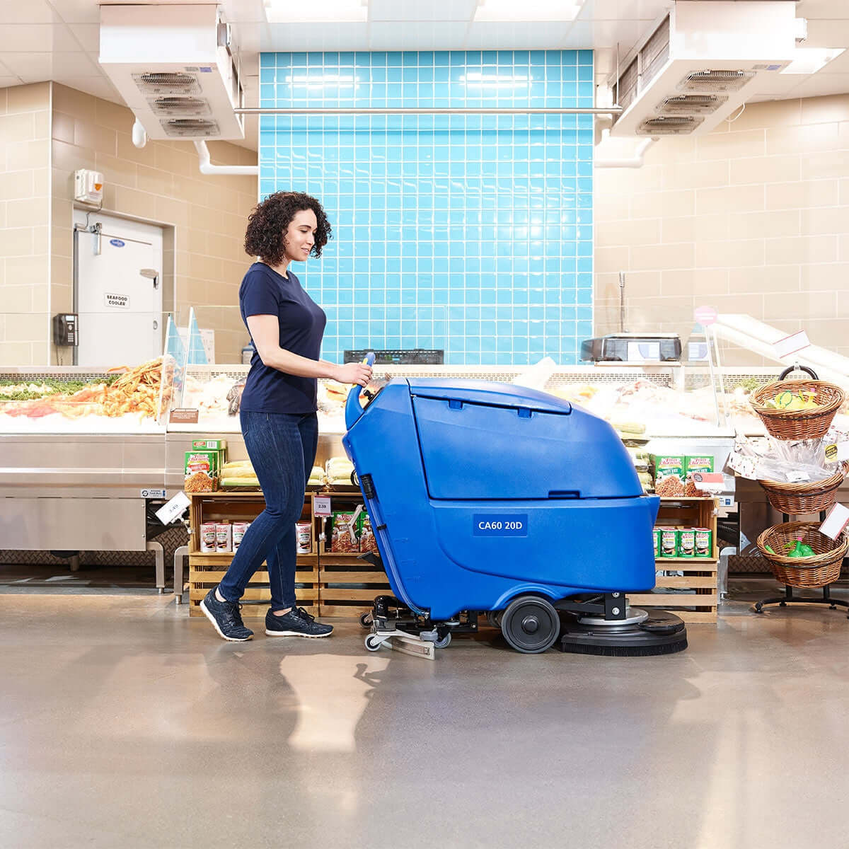 Cleaning a grocery store floor with the Clarke CA60 20D floor scrubber