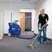 Woman using the Clarke TFC-400 on carpet.