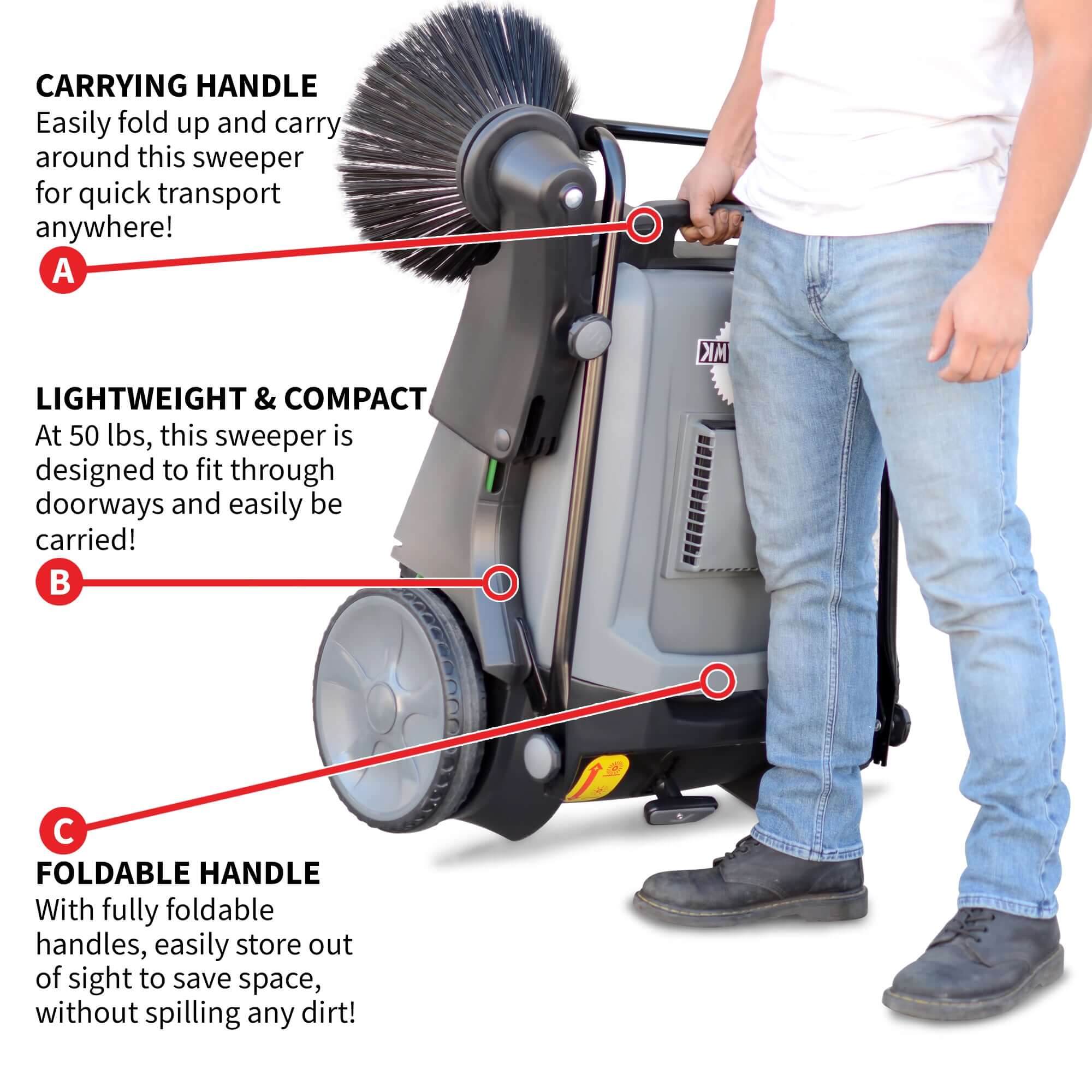 Compact and portable, the Tomahawk push sweeper with triple brooms is lightweight and company and includes a foldable handle. This image shows a person holding and carrying the Tomahawk sweeper in the 38" size.